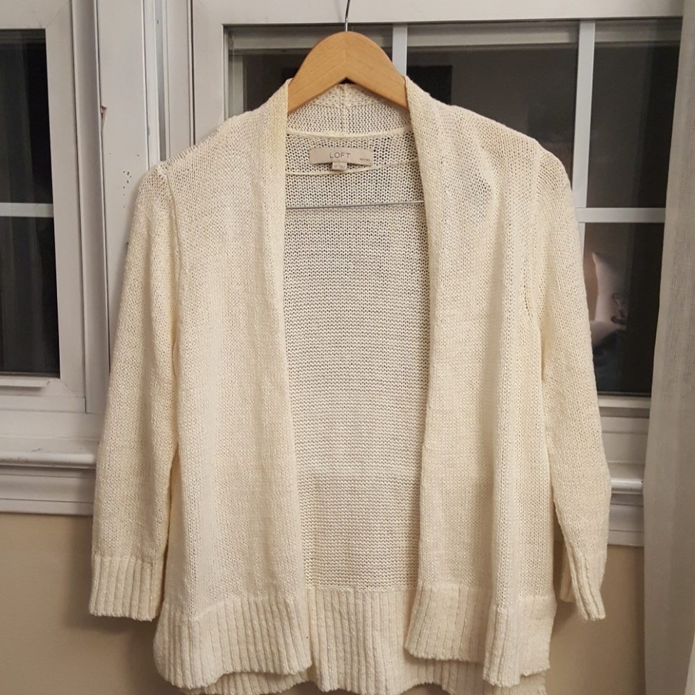 Open off white cardigan.