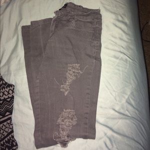 A pair of jeans and leggings.