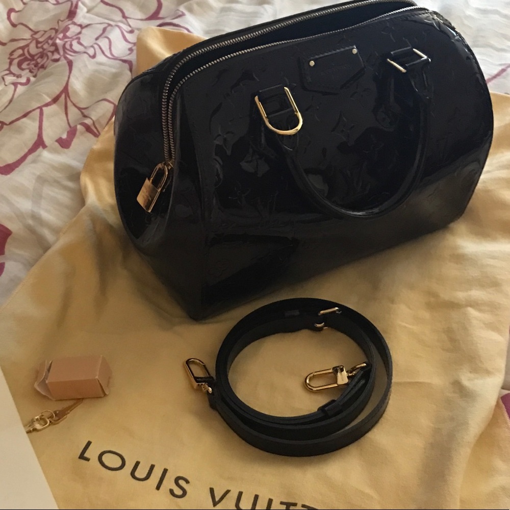 Louis Vuitton Montana bag in amarante vernis