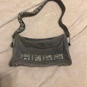 B.B. Simon blue jean styled/distressed leather bag
