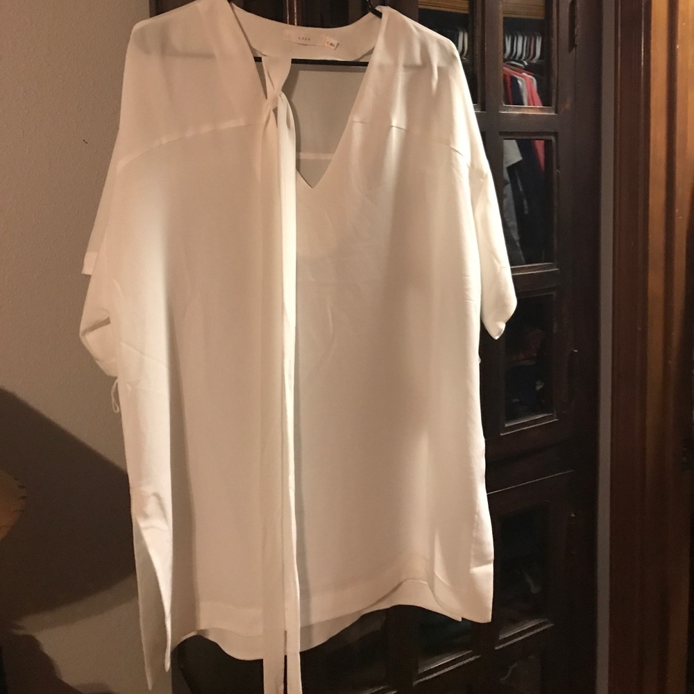 Lush blouse with tie belt