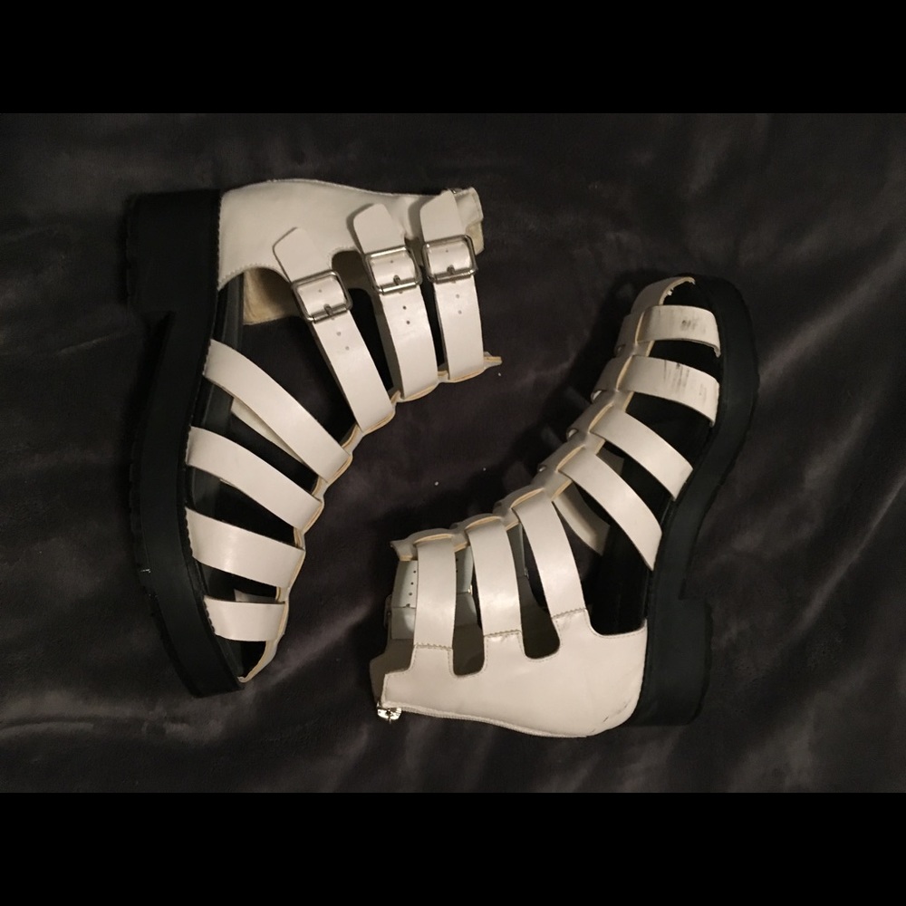 White gladiator style boots.