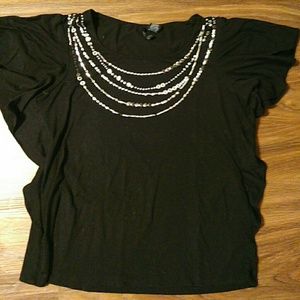 Black top winged short sleeve top.