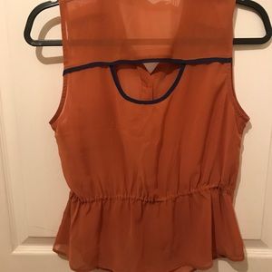 Orange and Blue collared tank.