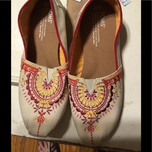 Tom's tan embroidered shoes