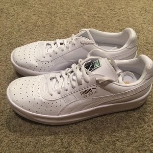 Brand new white Puma shoes!