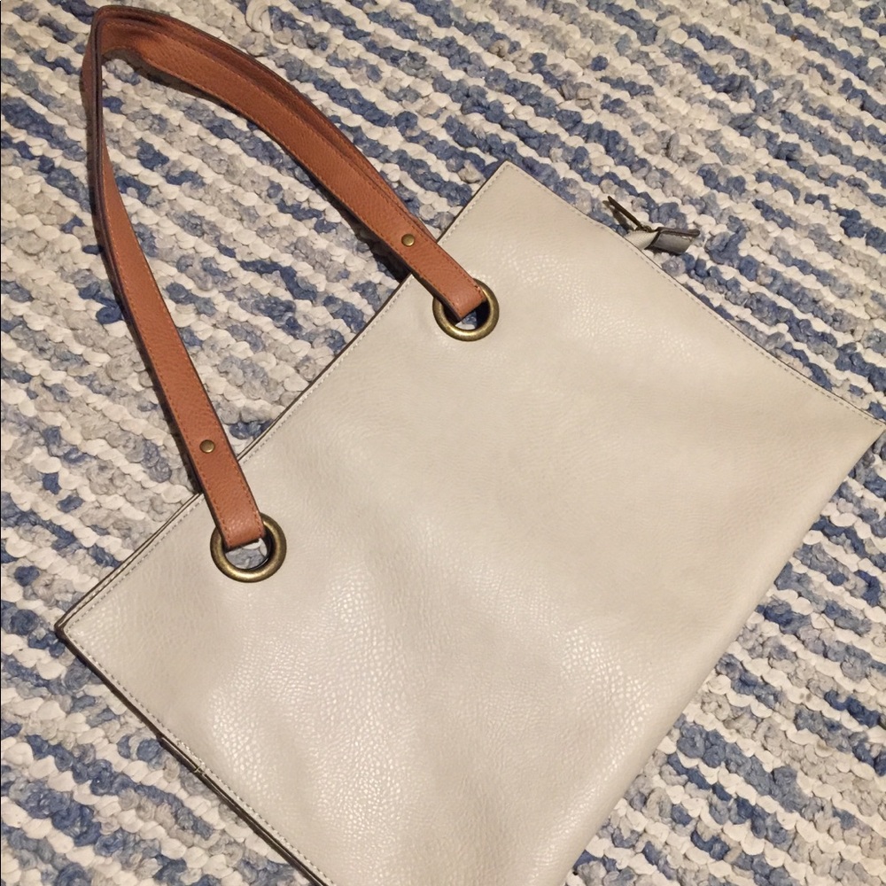 Carlos Santana beige bag!