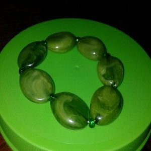 Green colored bracelet