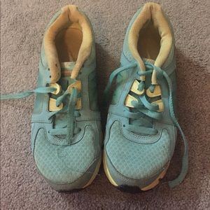 Size 8.5 aqua and lime green nikes.