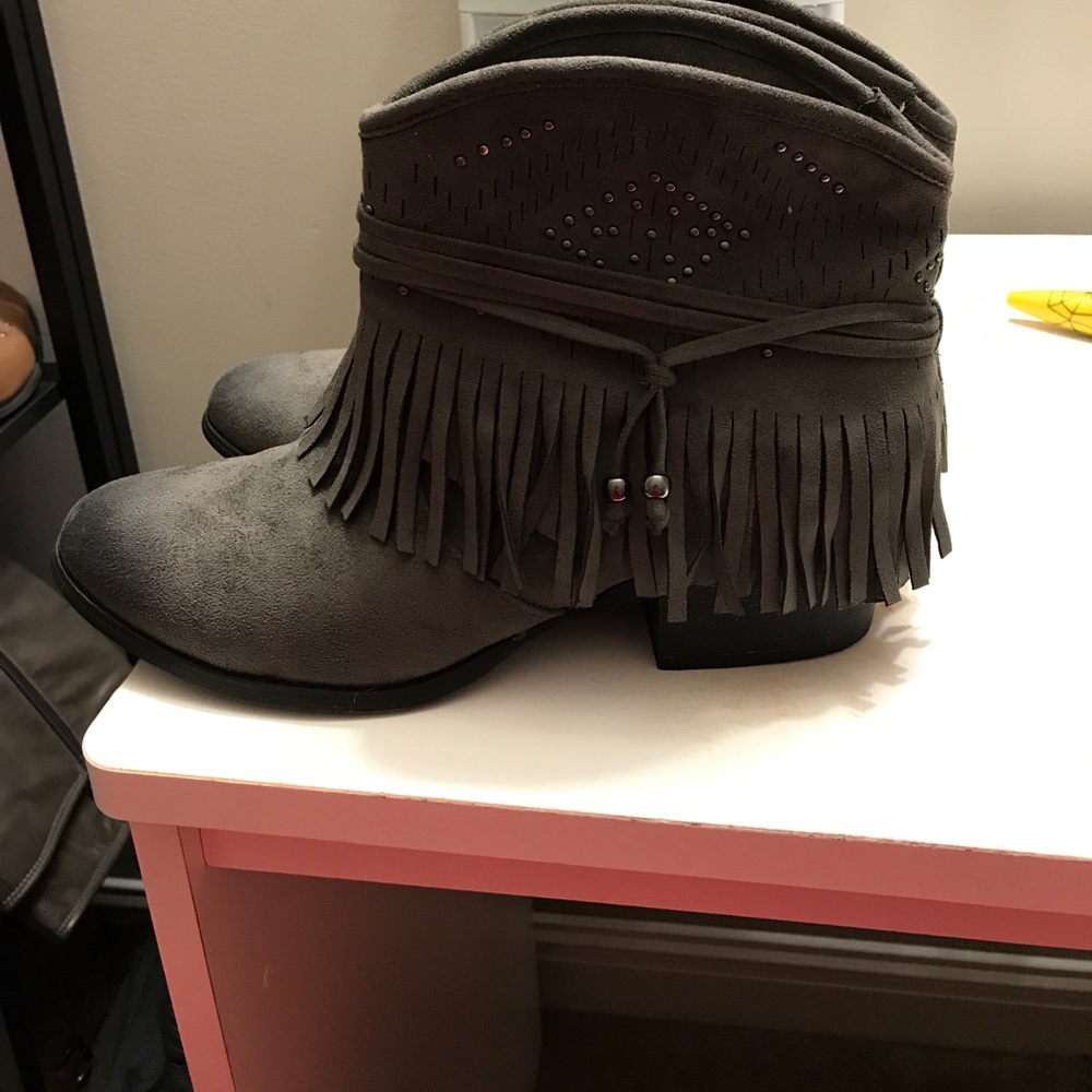 Like new boutique fringe boots!! MAKE OFFER