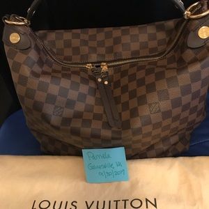 Authentic Louis Vuitton DUOMO HOBO 
Made in France