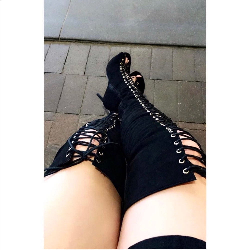 Thigh high lace up heels