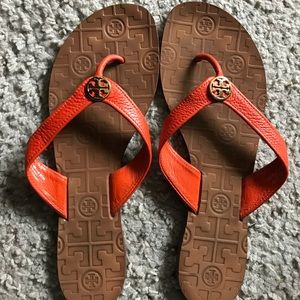 Gently used Tory Burch leather flip flops.