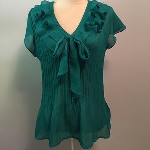 Green blouse with ruffles