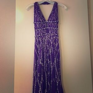Purple jeweled prom dress