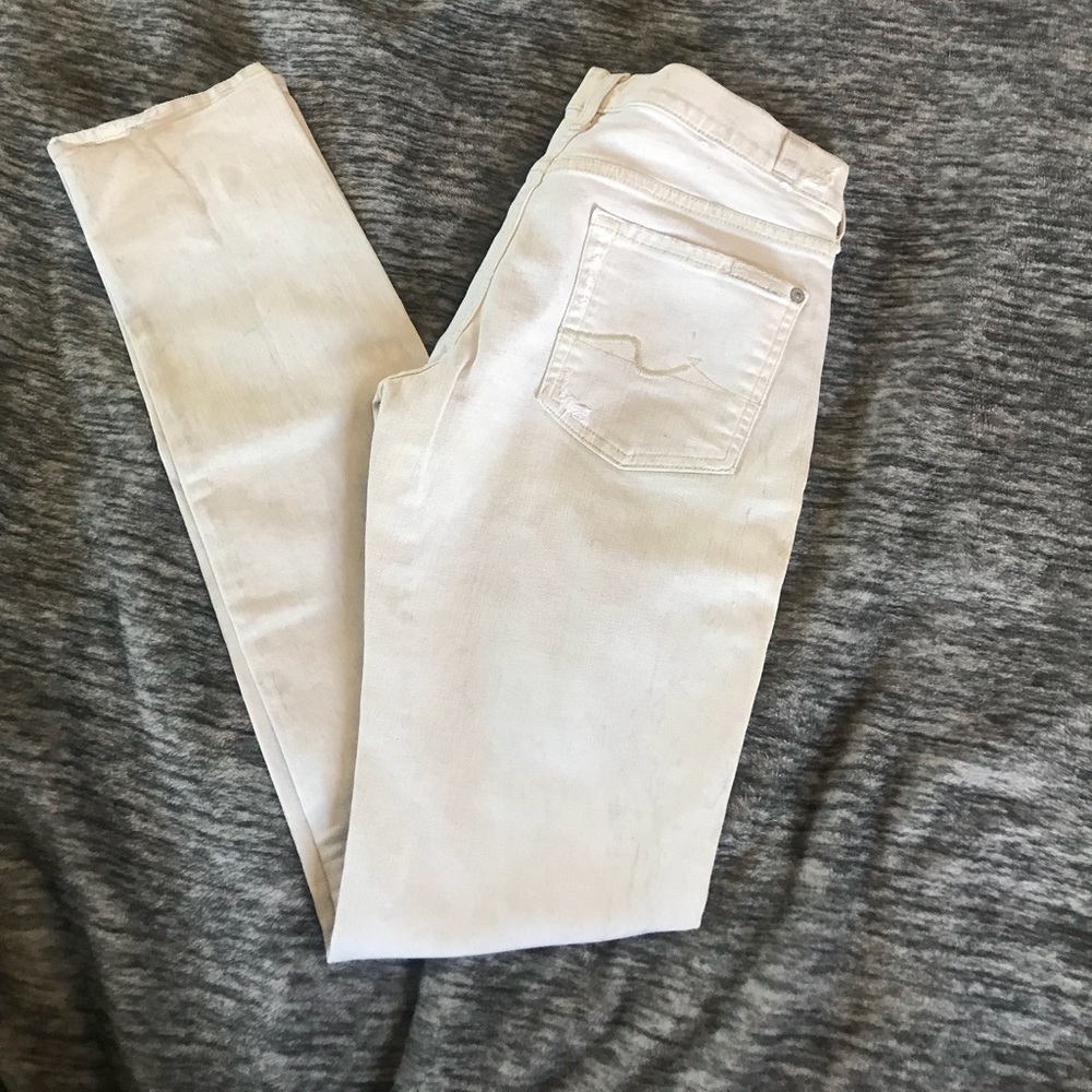 7 For All Mankind cream shredded jeans