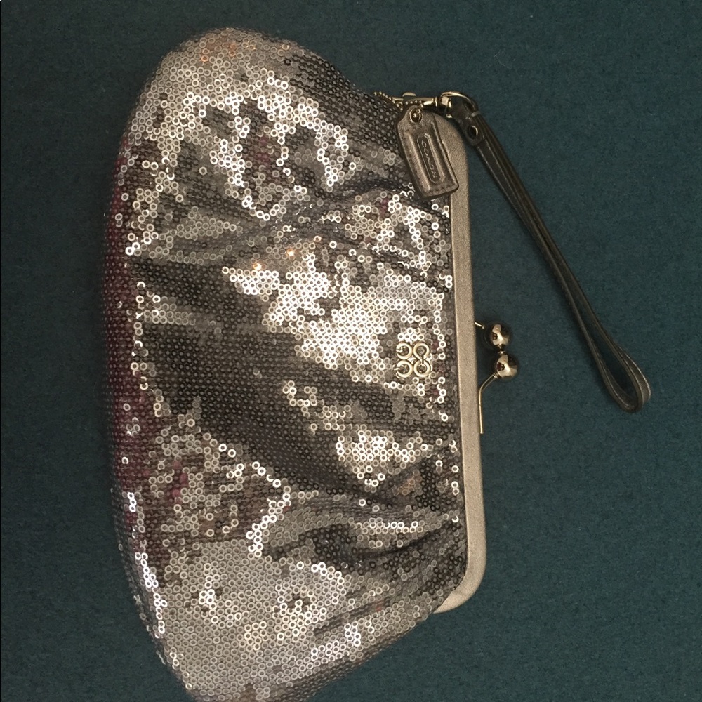 EUC Coach poppy silver sequined clutch