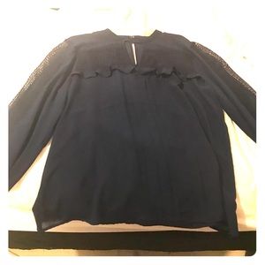 Dark blue (navy colored) blouse.