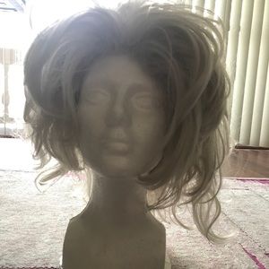 Custom made silver white wig and styrofoam base.