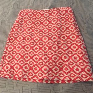 Above the knee Loft skirt in 10T. Coral and white.