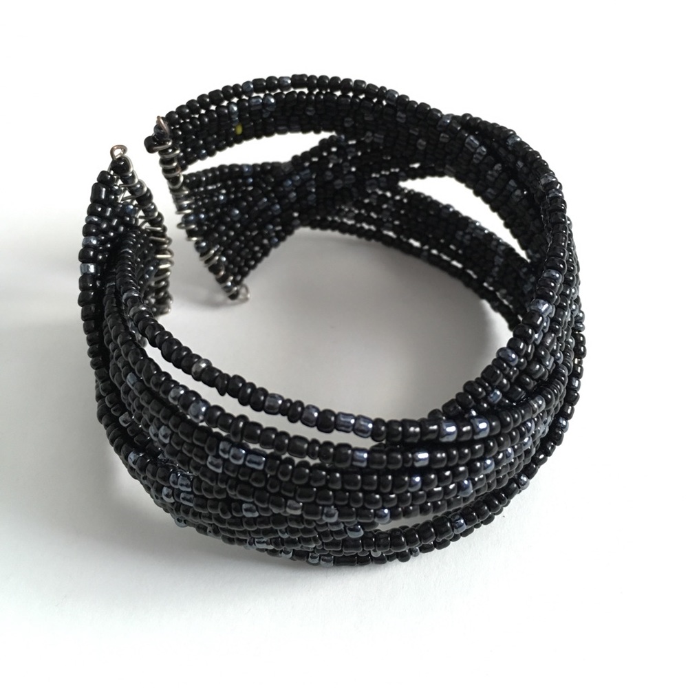 Black with shots of silver-blue beaded bracelet.
