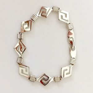 Sterling silver Aztec style bracket