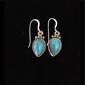 Genuine Silver andTurquoise earrings.