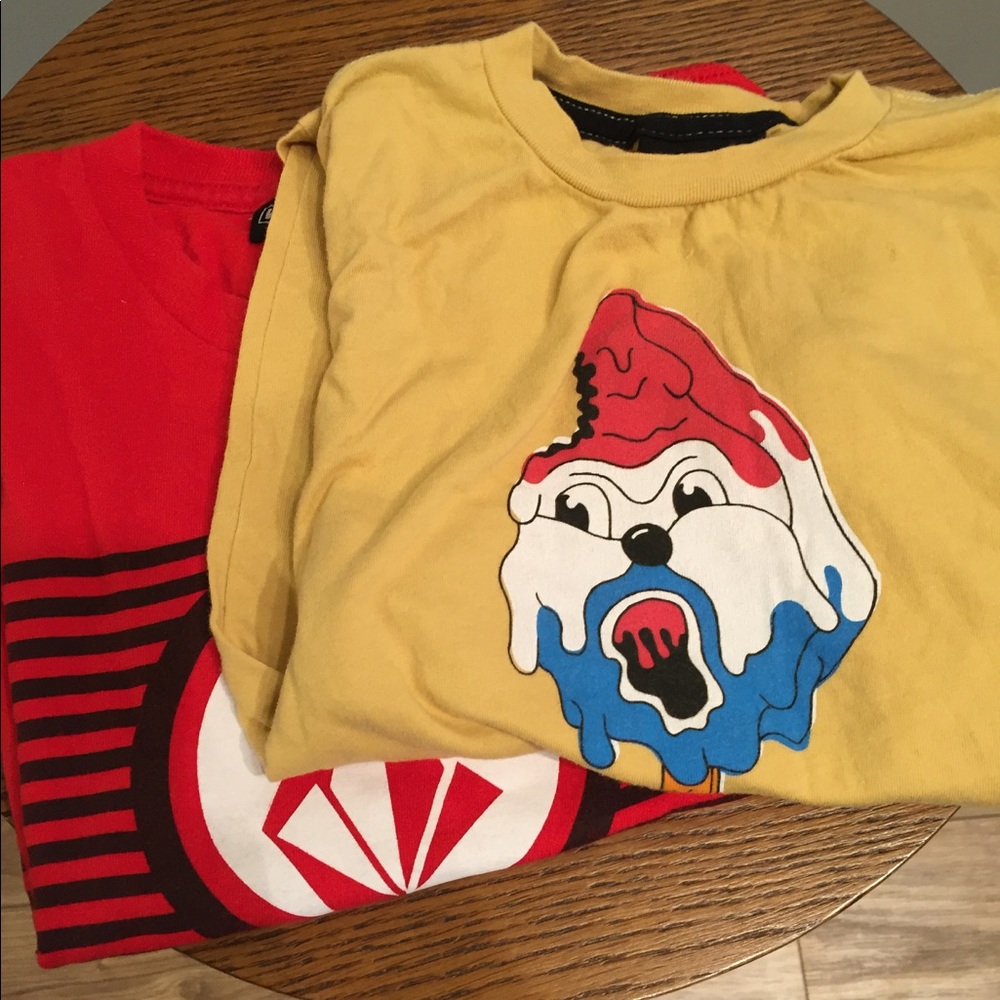 Pair of Volcom boys shirts medium red yellow