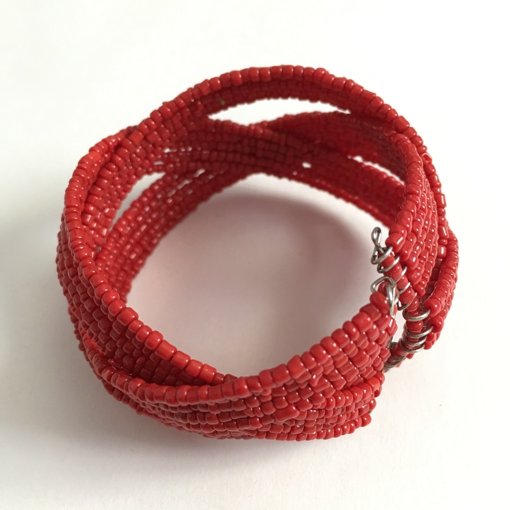 Red beaded bracelet.