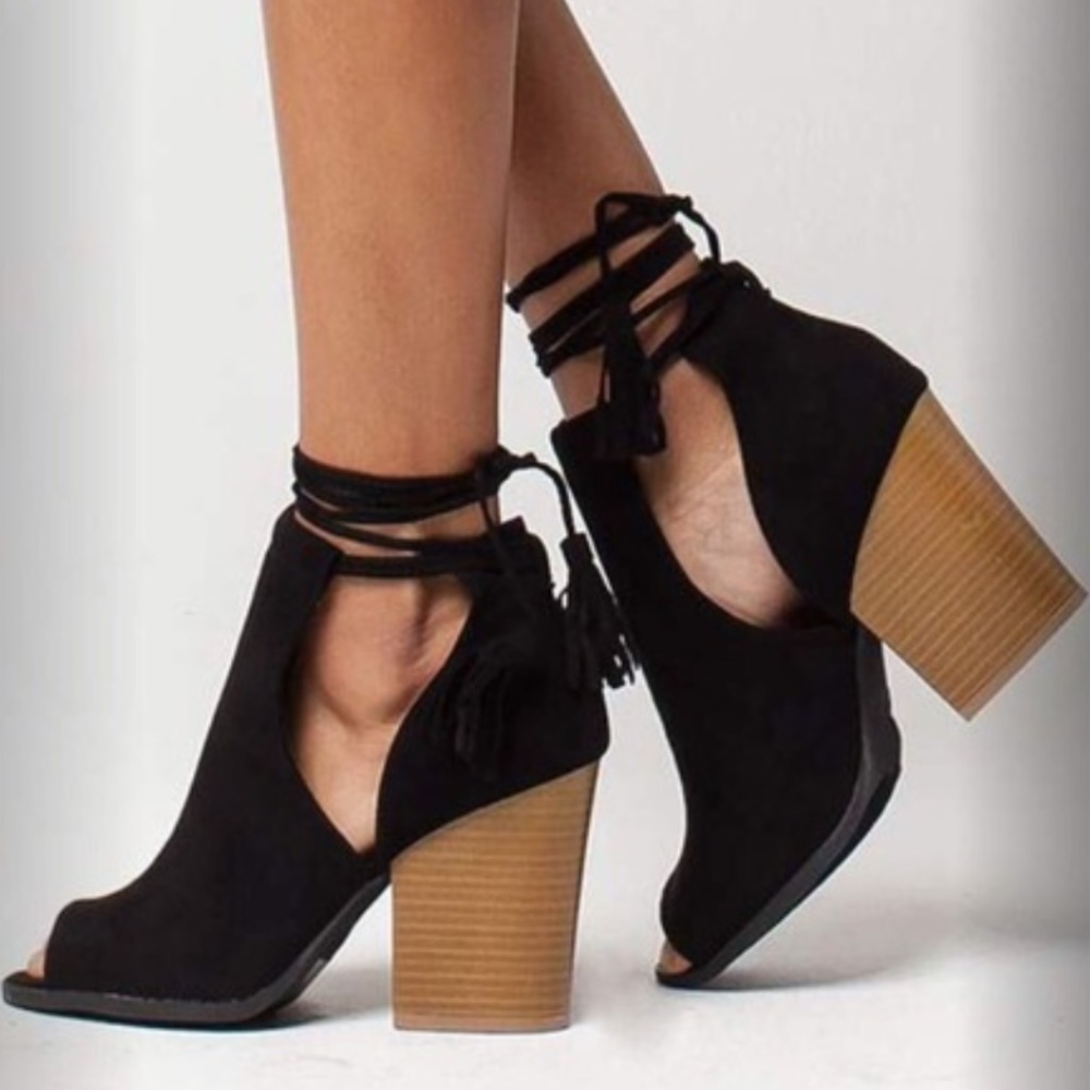 Black peep toe heeled booties