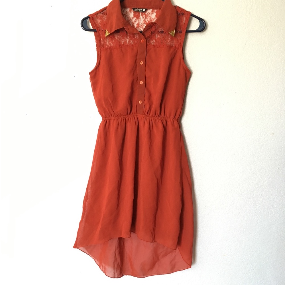 Red lace and sheer collard dress.