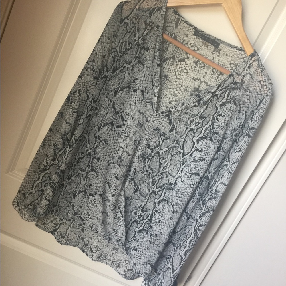 Feminine & pretty wrap style blouse