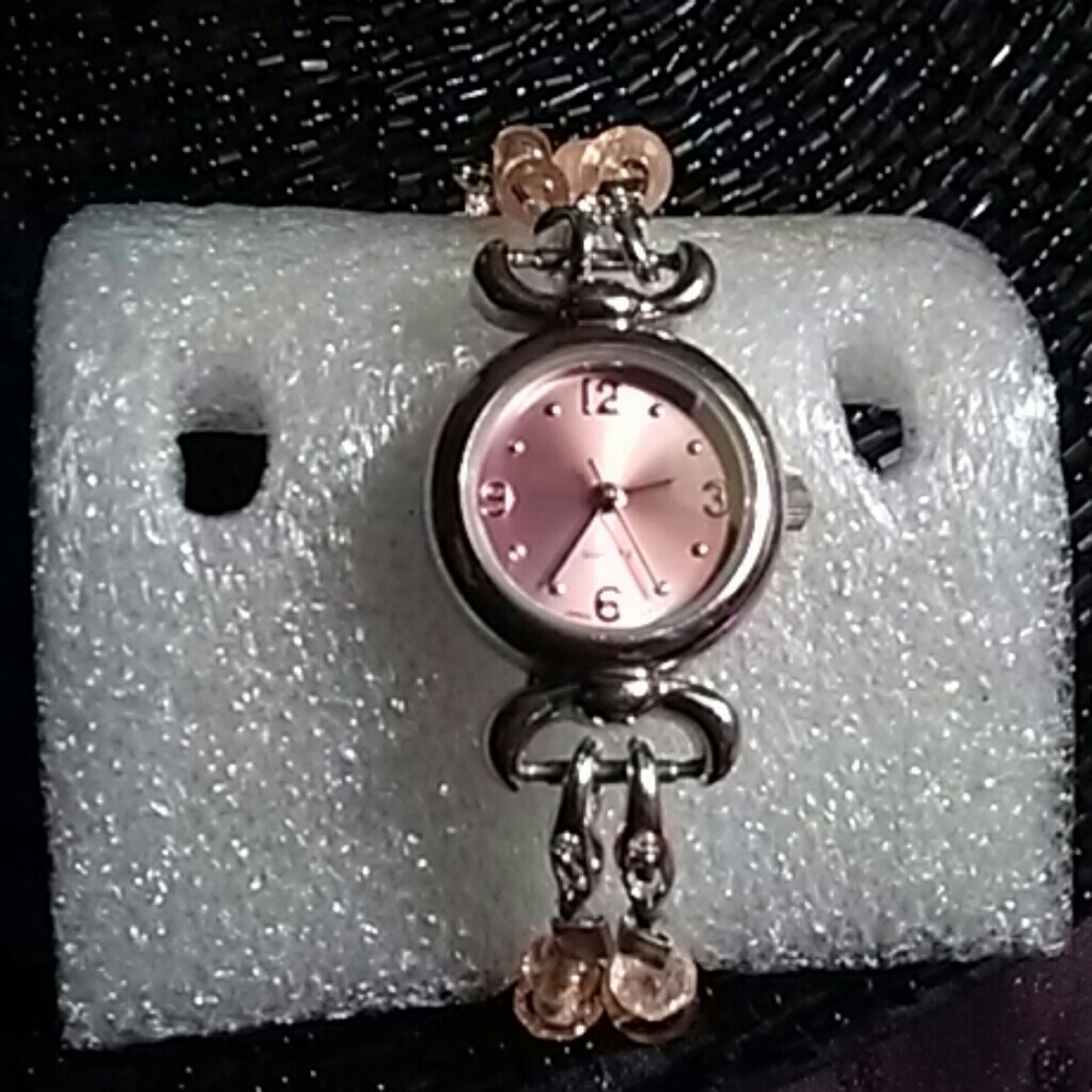 Pink and silver bracelet watch