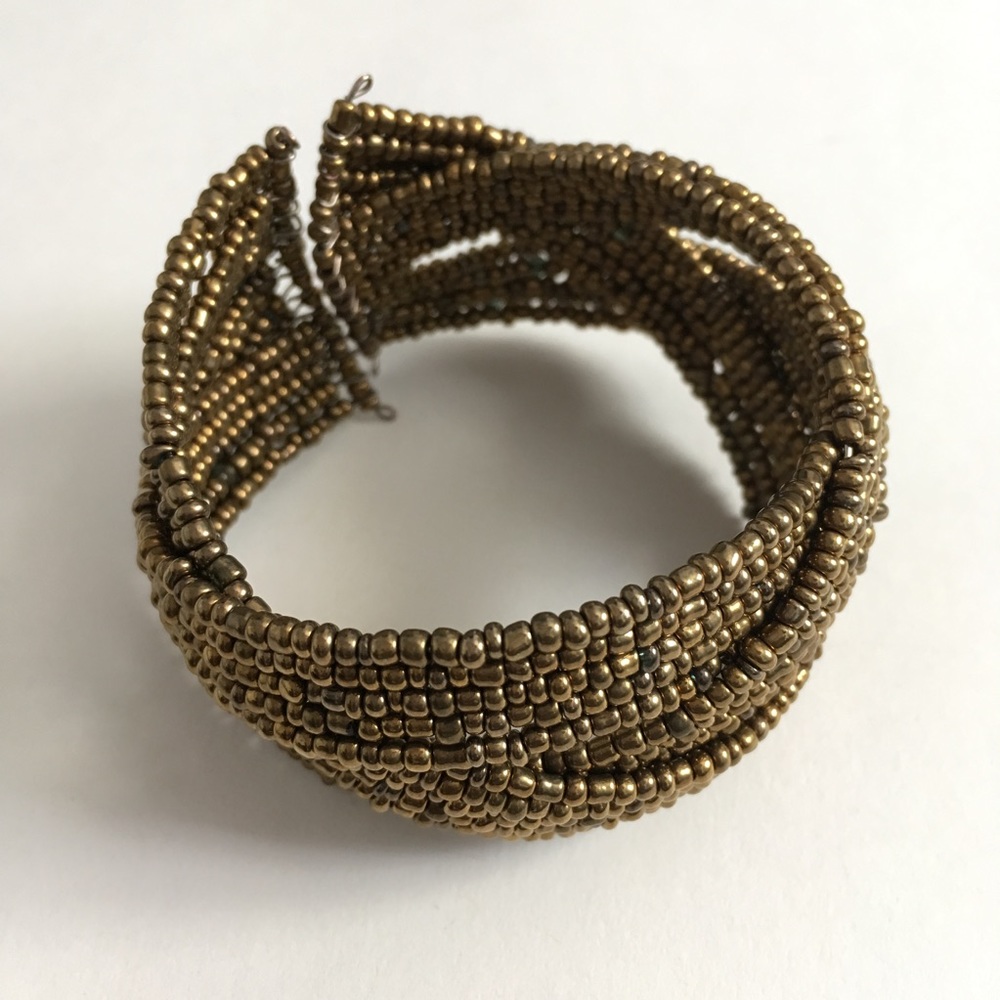 Gold beaded bracelet.
