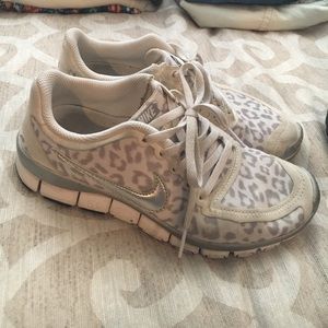 Grey and white cheetah Nike sneakers