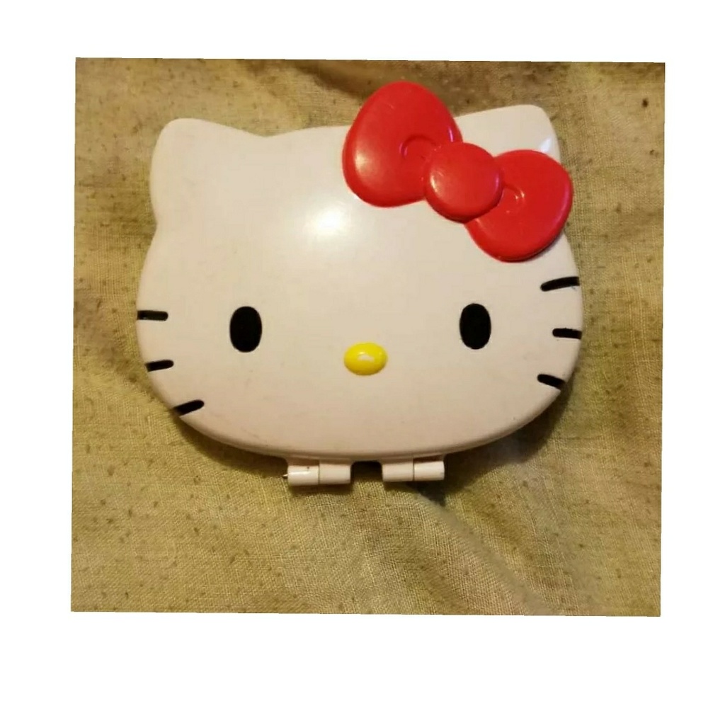 LOWEST PRICE: Hello Kitty DSI game holder
