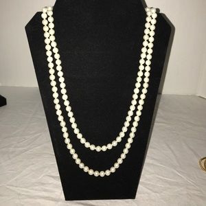 Extra long faux pearl necklace