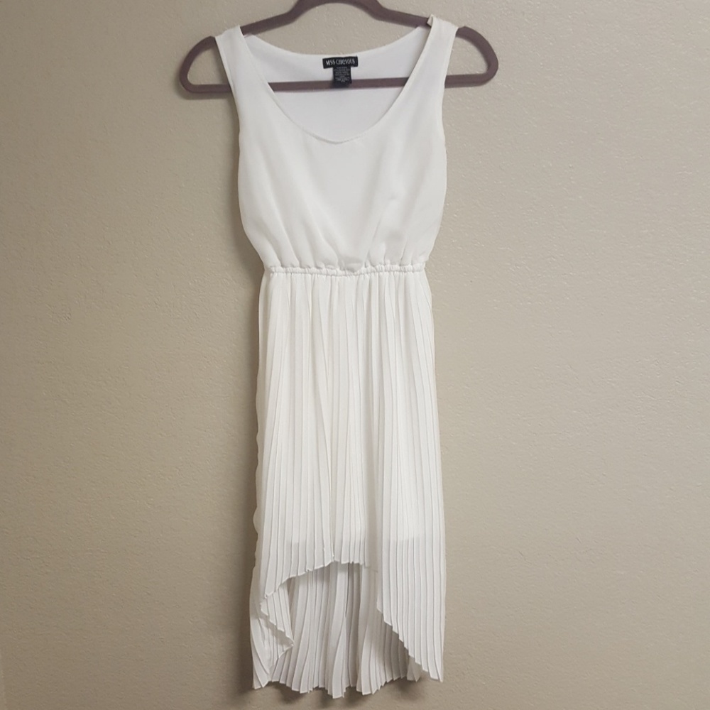 Pleated white sleeveless high low dress round neckline