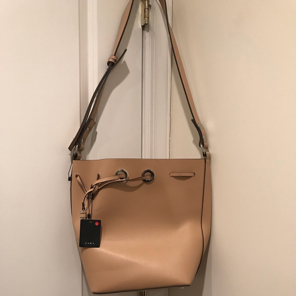 FREE ZARA BAG with Purchase of $100 or more.