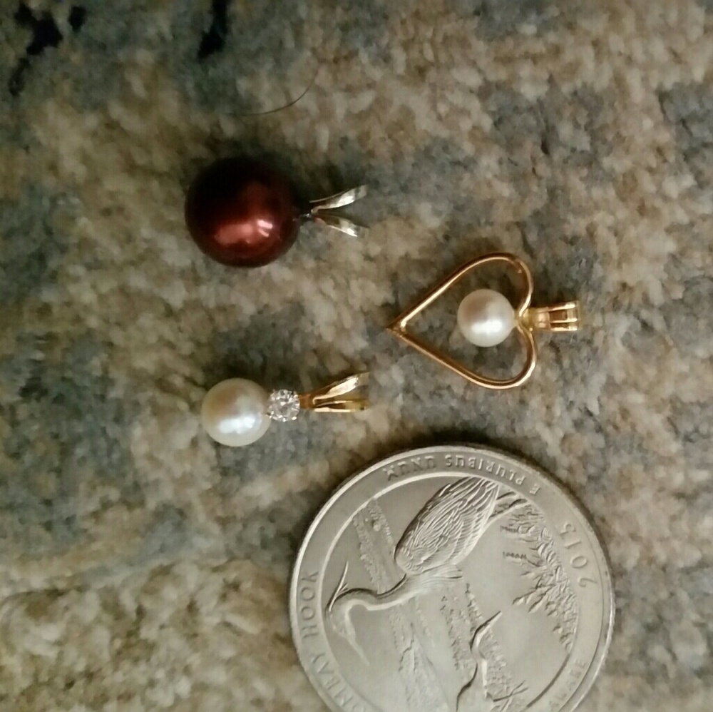 3- Three 14k pearl pendants