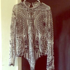 Tribal print body suit