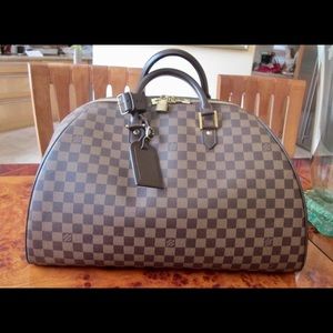 Authentic Louis Vuitton travel bag