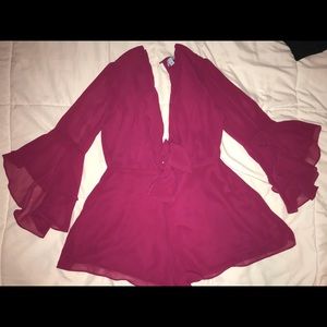 Pink romper with tie front