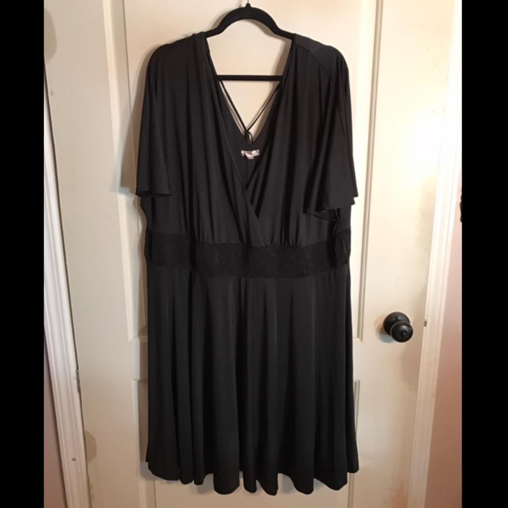 Black elbow sleeve dress with back tie detail