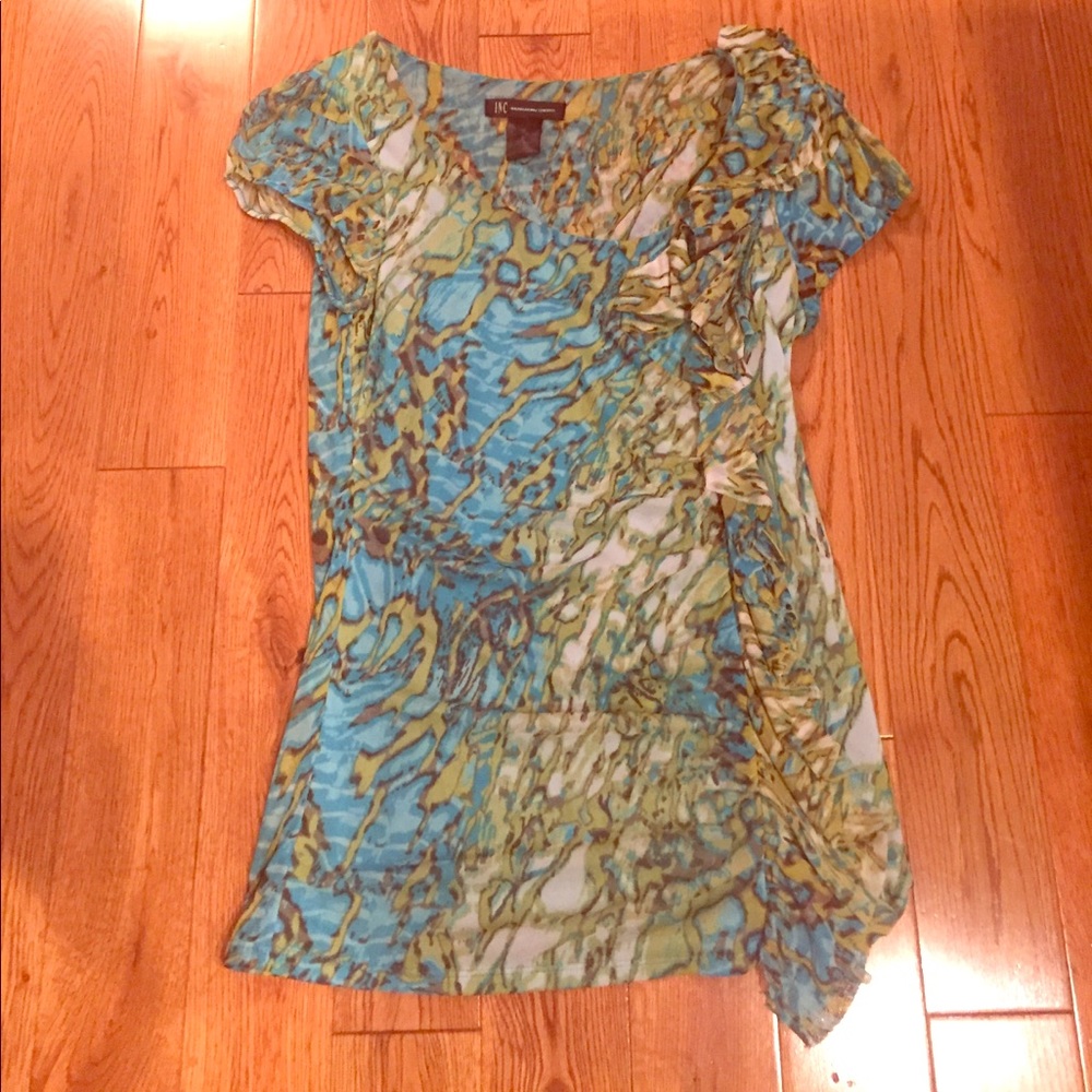 Multi colored leopard / animal type shirt