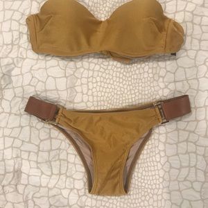 .mobo bikini with leather hardware