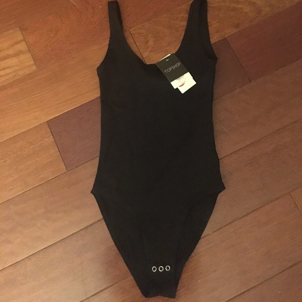 “Black Stretch Cotton Bodysuit” unworn