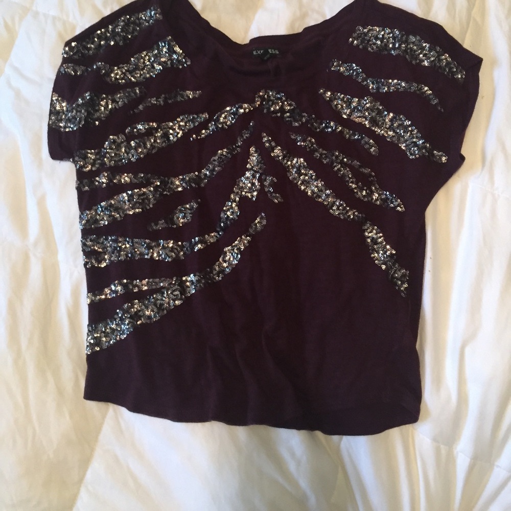 Cute Express Top. Maroon in color.