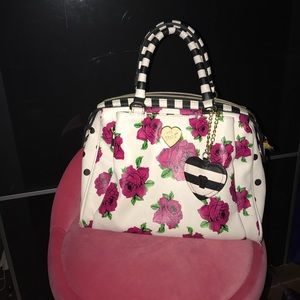 Black and cream Betsey Johnson purse with roses