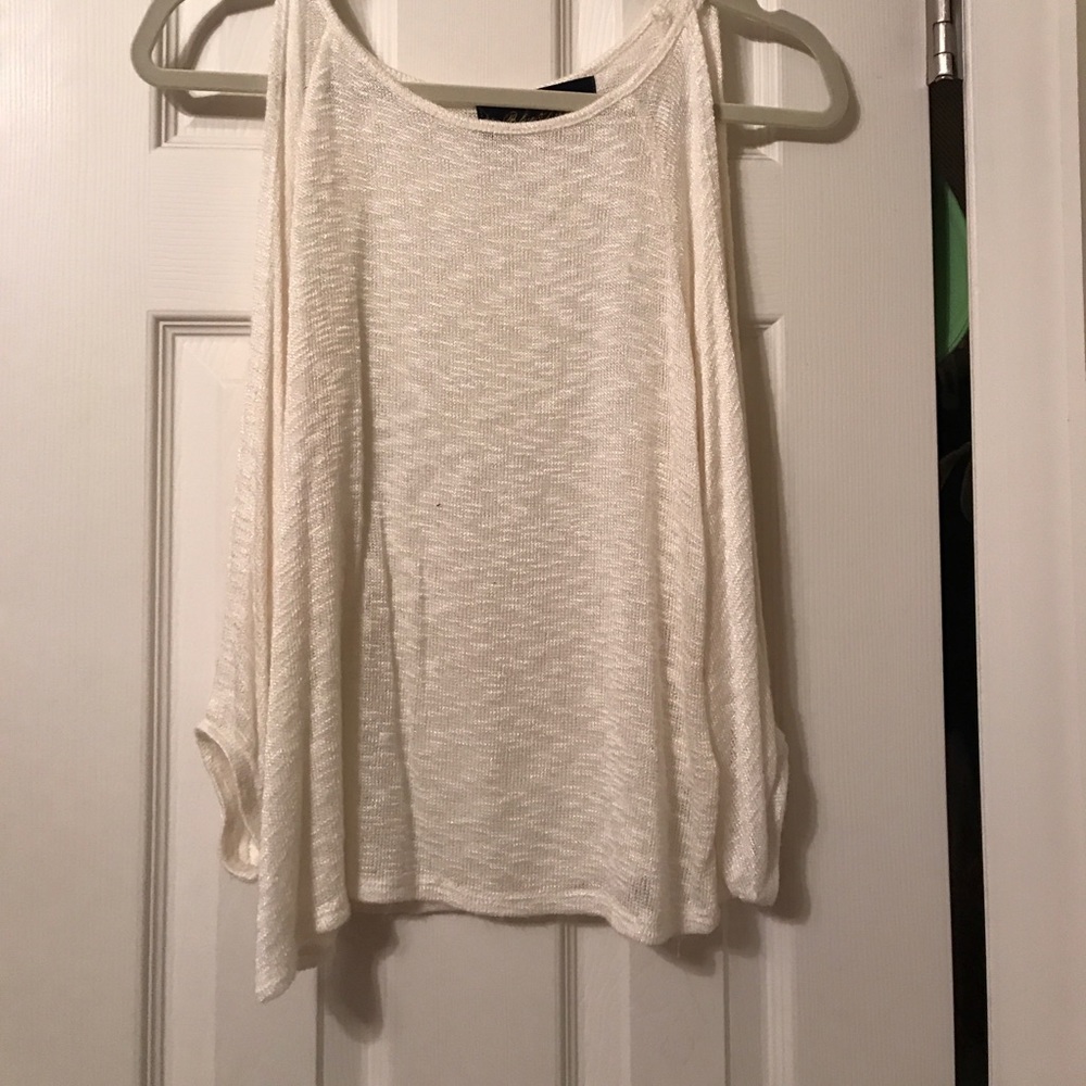 White shirt with open sleeves